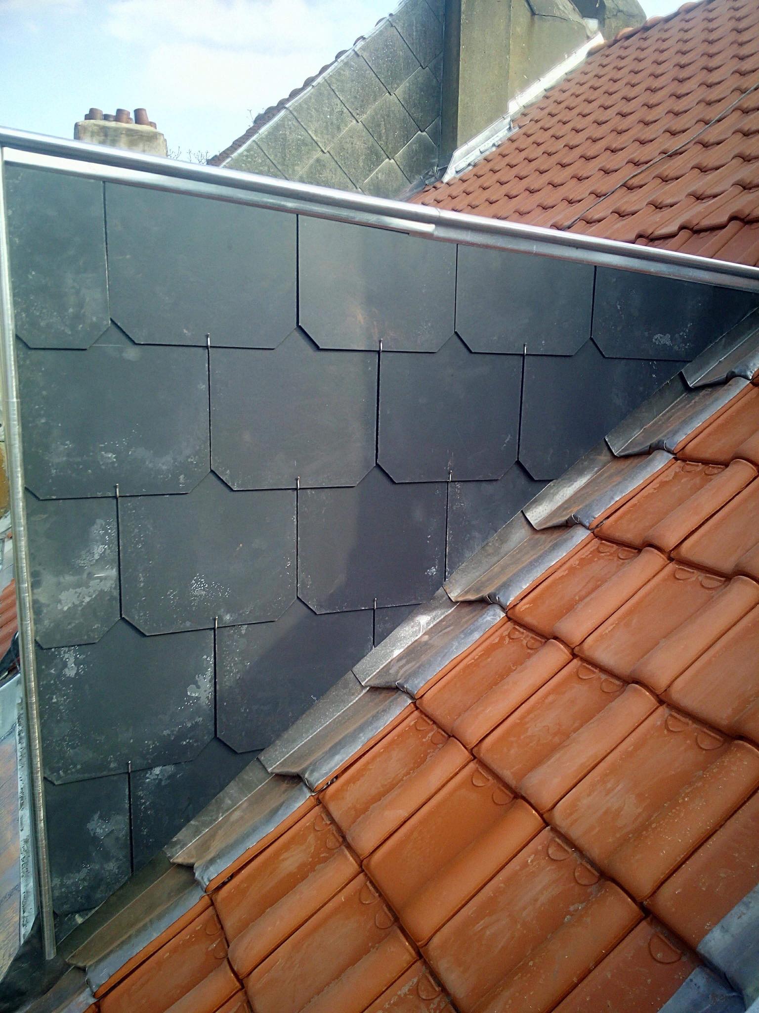 Réparation toiture corniches gouttières et zinc