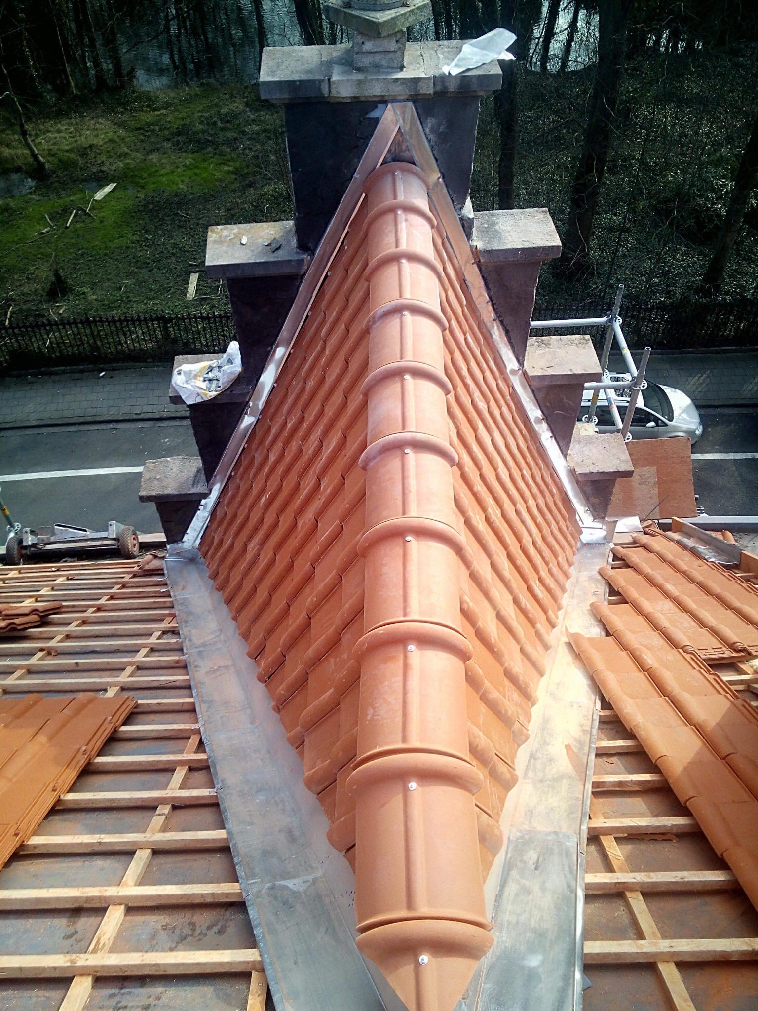 Réparation toiture corniches gouttières et zinc